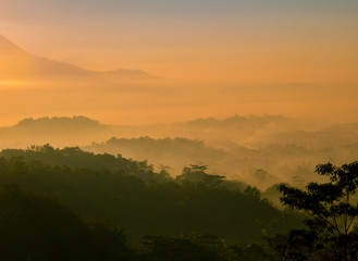 Misty sunrise over a valley