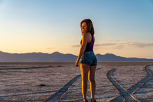 Beautiful Woman Doing Handstands In The Bonneville Salt Flats