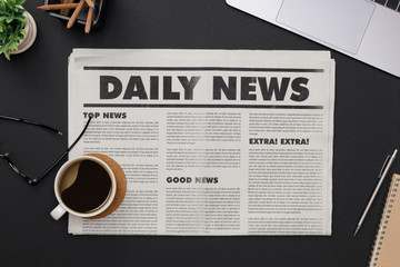 Wall Mural - Business Newspaper and office supplies with notebook, hot coffee cup, glasses, books, newspaper and accessories on black desk topview with copy space, Daily Newspaper mockup concept