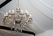 Chrystal Chandelier Lamp On The Ceiling In A Wedding Tent. Decorative Contemporary And Elegant Vintage  Interior Concept.