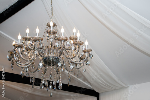 Fotomural Chrystal chandelier lamp on the ceiling in a wedding tent