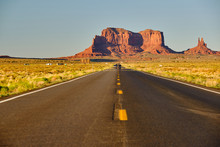 Empty Scenic Highway In Monument Valley, Arizona, USA
