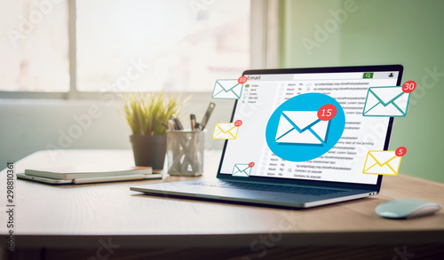 Fotografía New email alert on laptop, communication connection message to global letters in the workplace