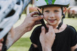 © Yakobchuk Olena - Father helping his adorable daughter to put on bicycle helmet
