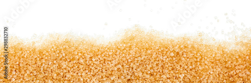 Fotografía brown sugar crystals on white background, panorama