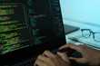 © PhotoJuthamat - developer working programming and coding technology Website design Safety of the social working on laptop, digital security online Cyber internet concept.Soft focus blur