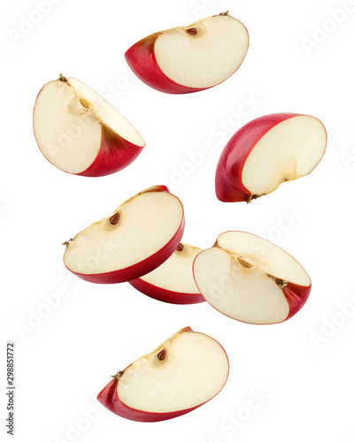 Cuadros en Lienzo Falling Red apple slice isolated on white background, clipping path, full depth