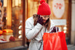 © gpointstudio - Excited woman talking about what she bought