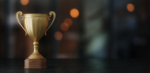 Wall Mural - gold cup winner on dark bokeh background