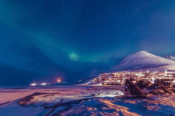 Wall Mural - the polar arctic northern lights hunting aurora borealis sky star in norway travel photographer sval