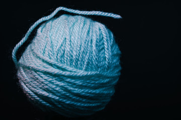 Poster - Beautiful blue tangle of thread in red and blue light background texture.