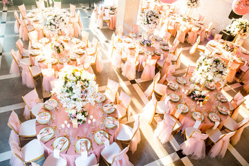 Wall Mural - Beautiful dinner table decorated by gold accessories and flowers. Wedding. Decor