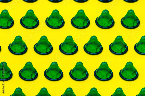 Cuadros en Lienzo many condoms isolated on the yellow background,collection, composition of condom