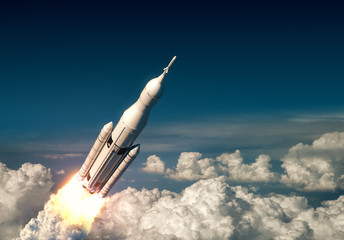 Wall Mural - flight of big carrier rocket above the clouds