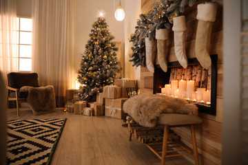 Sticker - Stylish room interior with beautiful Christmas tree and decorative fireplace