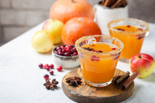 Spicy Hot Pumpkin Punch Or Sangria In A Glass With Apple, Cinnamon, Anise. Halloween And Thanksgiving. Traditional Autumn, Winter Drinks And Cocktails