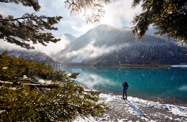 Man at Mountain Lake in Kazakhstan