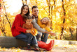 © New Africa - Happy family with little daughters in park. Autumn walk