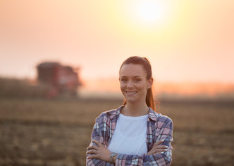 Canvas Print - Farmer woman with crossed arms at corn harvest