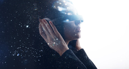 Wall Mural - double exposure of female face. abstract woman portrait. digital art. girl in glasses of virtual rea