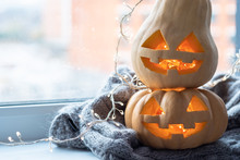 Jack O Lanterns Halloween Pumpkins Face On A Window