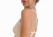 © dream@do - Woman with birthmark on her back, skin. Checking benign moles. Skin tags removal