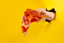 Hand Giving Slice Of Pizza