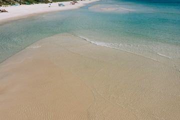 Wall Mural - Drone photograph of waves and sandbar at beach