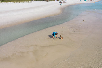 Wall Mural - Father and Child Playing at Beach