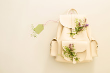 White Backpack Decorated With Spring Flowers And Blank Tag