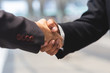 © eakgrungenerd - close up businessman man and businesswoman handshake for partner, Business concept.