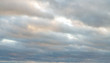 © Dmitri - Partial clouds. Clearing day. Dark sky on the background with Air clouds. sky panorama, scattered cumulus clouds for backdrop wallpaper, desktop. Copy space.