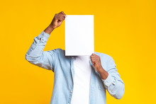 Black Guy Covering His Face With White Blank Paper