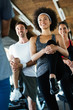 © NDABCREATIVITY - Picture of cheerful fitness team people in gym