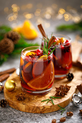 Christmas mulled wine. Traditional Xmas festive drink with decorations and fir tree