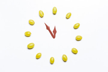 Clock of 12 piece grapes. New Year concept. Spanish tradition for the new year.