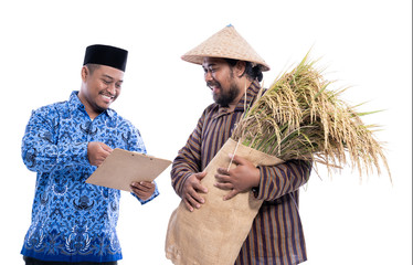 Wall Mural - portrait of farmer and partner discussion while holding a bag of rice grain