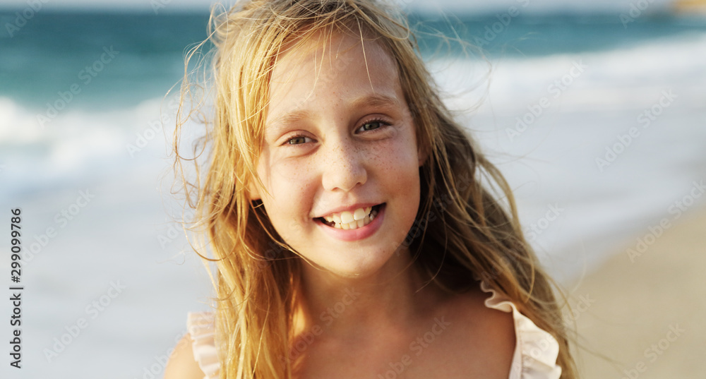 Adorable happy smiling little girl on beach vacation Stock Photo ...