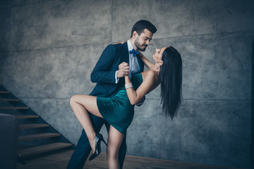 Aufkleber - Profile photo of two stylish trendy people couple guy and lady slow dancing bending back holding hands bride and fiance tango wear luxury formalwear suit short mini dress loft indoors