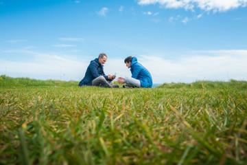 Father and son flying drone