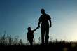 © Kostia - father and son silhouette