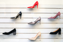 Womens Shoes On Shelves. Collection Of Shoe Display In Store Window For Sale