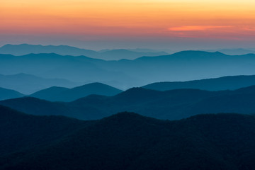 scenic drive from cowee mountain overlook on blue ridge parkway at sunset time.