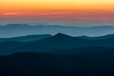 Fototapeta Na ścianę - Scenic drive from Cowee Mountain Overlook on Blue Ridge Parkway at sunset time.