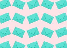 Creative Pattern Made Of Turquoise Envelopes On Pastel Pink Background.