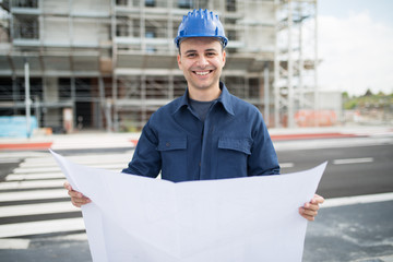 Wall Mural - Site manager in front of a construction site