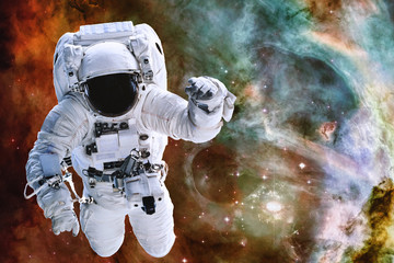 astronaut somewhere in deep space. elements of this image were furnished by nasa