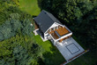 © Dariusz Jarzabek - Stylish house with cobblestone driveway