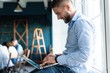 © opolja - Man Working At Laptop In Contemporary Office