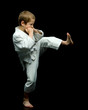 © lotosfoto - A little boy in a white kimono fulfills blows